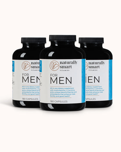 Three bottles of 'Naturally Smart' men's dietary supplements on a white background