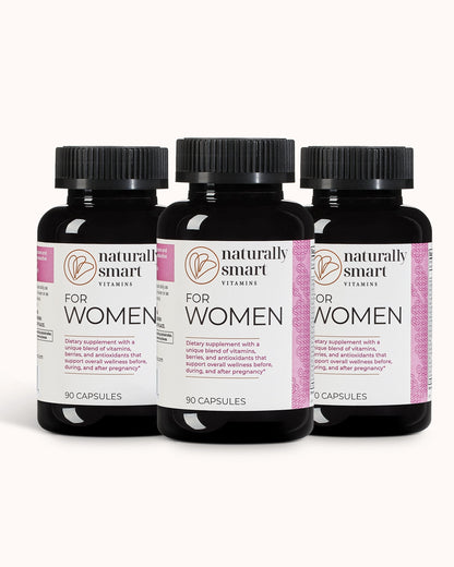 Three bottles of 'Naturally Smart' women's supplement on a white background